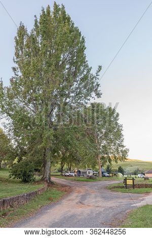 Royal Natal National Park, South Africa - March 6, 2020: A View Of Mahai Camp. A Caravan, People, Te