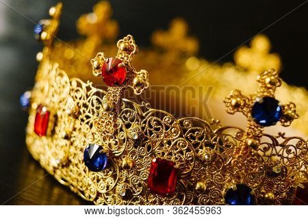 Golden Crown Encrusted With Blue And Red Gemstones