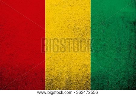 The Republic Of Guinea National Flag. Grunge Background