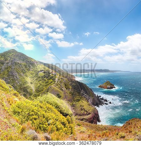 Astonishing Spring View Of Nebida And Fontanamare Coastline With Scoglio Il Morto And Turquoise Sea.