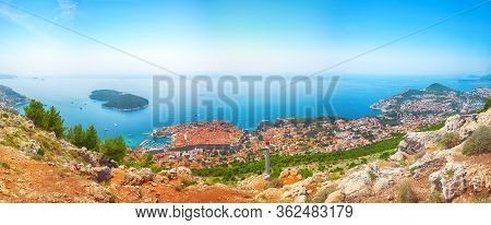 Aerial Panoramic View Of The Old Town Of Dubrovnik With Famous Cable Car On Srd Mountain On A Sunny 