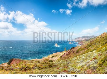 Fantastic Spring View Of Ancient Ruins Of Laveria Lamarmora (miniera Di Nebida) And Nebida Coast. St