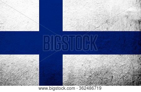 National Flag Of Finland Siniristilippu. Grunge Background