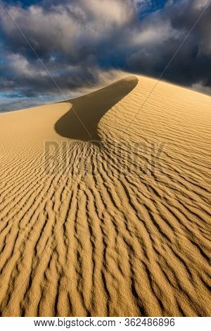 A Dramatic Vertical Rippled Dune Landscape Taken On A Cloudy Stormy Afternoon In Arniston, South Afr