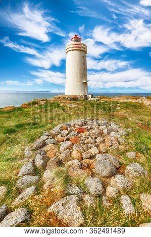 Stunning View Of Skarsviti Lighthouse In Vatnsnes Peninsula On A Clear Day In North Iceland. Locatio