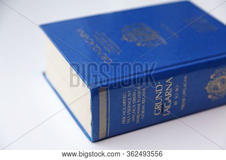 Umea, Norrland Sweden - March 23, 2020: Statute Book Lying On A White Table