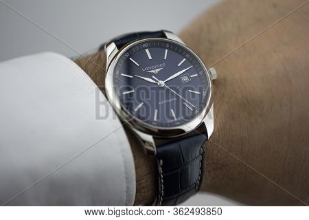 Saint-imier, Switzerland 31.03.2020 - Closeup Fashion Image Of Longines Watch On Wrist Of Man Longin