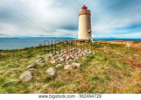 Stunning View Of Skarsviti Lighthouse In Vatnsnes Peninsula On A Clear Day In North Iceland. Locatio