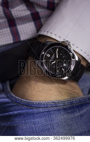 Ibach, Switzerland 31.03.2020 - Closeup Fashion Image Of Victorinox Watch On Wrist Of Man: Mans Hand