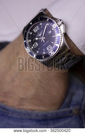 Saint-imier, Switzerland 31.03.2020 - Closeup Fashion Image Of Longines Watch On Wrist Of Man: Mans 
