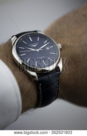 Saint-imier, Switzerland 31.03.2020 - Closeup Fashion Image Of Longines Watch On Wrist Of Man Longin