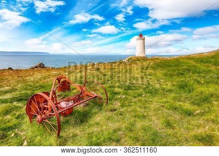 Stunning View Of Skarsviti Lighthouse In Vatnsnes Peninsula On A Clear Day In North Iceland. Locatio