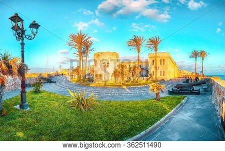 Gorgeous Evening Cityscape Of Historical Part Of Alghero Town. Fantastic  Mediterranean Seascape. Lo