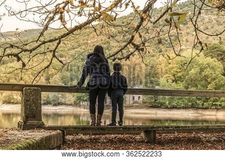 Mother And Son Before A Separation In The Park