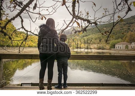 Mother And Son Before A Separation In The Park