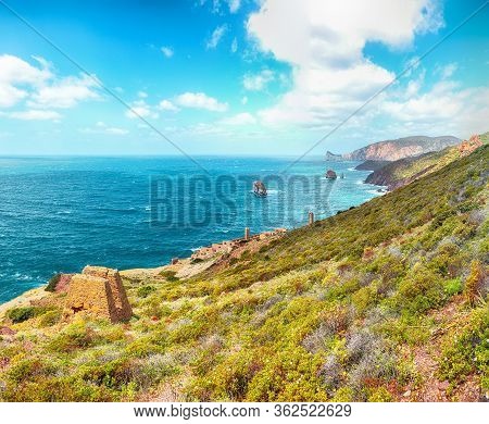Splendid Spring View Of Ancient Ruins Of Laveria Lamarmora (miniera Di Nebida). Stunning Mediterrane