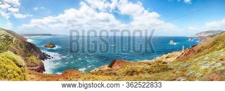 Astonishing Spring View Of Nebida And Fontanamare Coastline With Scoglio Il Morto And Turquoise Sea.