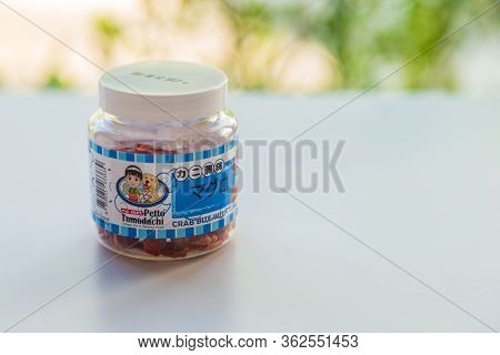 Bangkok, Thailand- April 21, 2020 : Petto Tomodashi Cat Snack Crab Bite Bottle On White Table With G