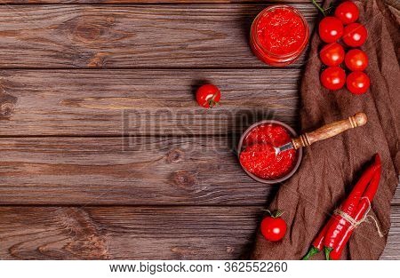 Ajvar Or Pindjur Red Vegetable Spread Or Pepper Paprika And Tomato Mousse In A Clay Bowl On A Rustic