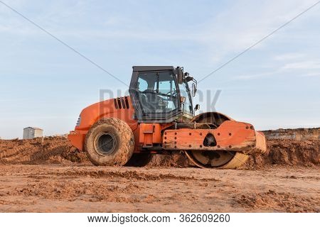 Vibration Single-cylinder Road Roller Leveling The Ground For The Foundation. Soil Compactor For Lay