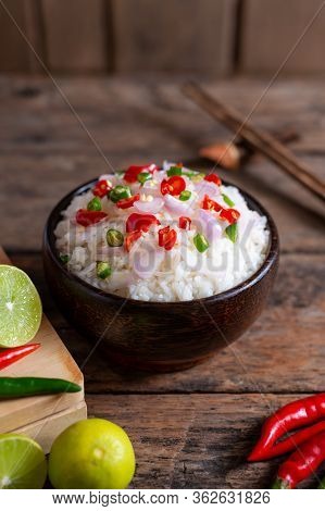 Brow Rice Spicy Asian Food With Vegetable And Chopstic On Wooden Background