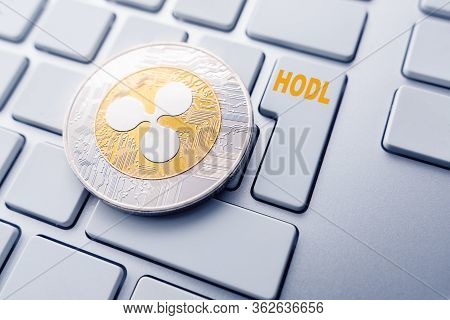 Ripple Hodl Concept. Toned Soft Focus Picture. Conceptual Image For Worldwide Cryptocurrency And Dig