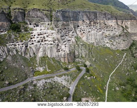 Aerial View To Vardzia Cave Monastery - Excavated From Erusheti Mountain On The Left Bank Of The Mtk