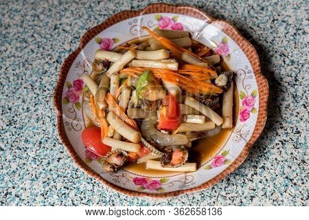 Thai Papaya Salad With Lotus Leaf. Papaya Salad Or What We Called In Thai Som Tum With Lotus Stem Is