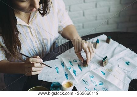 Girl Master Makes Stamps On The Fabric. Handmade