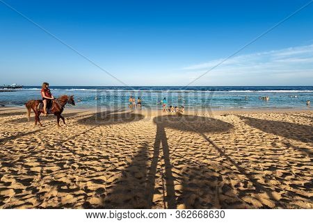 Marsa Alam, Red Sea, Egypt - Nov 1, 2018: Red Sea Beach Near Marsa Alam, Egypt, Africa. A Young Girl