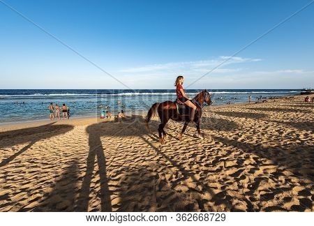 Marsa Alam, Red Sea, Egypt - Nov 1, 2018: Red Sea Beach Near Marsa Alam, Egypt, Africa. A Young Girl