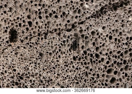 Surface Of Brown Pumice - Closeup. Pumice Brown Sponge Texture For Body Wash. High Resolution Photo.