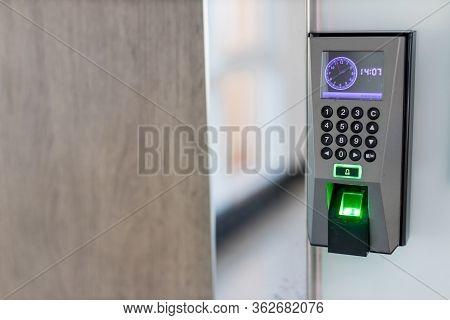 Finger Scan On Machine Security Concept And Safety. Soft Focus On Hand Scanning Finger On Machine Co