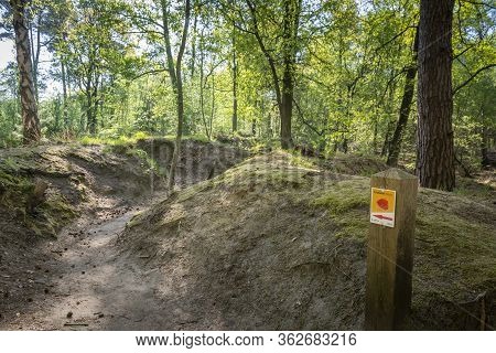 Kapellen, Belgium, April 2020: Loopgravenpad, Walkway Through Trenches, In Mastenbos Kapellen, Part 