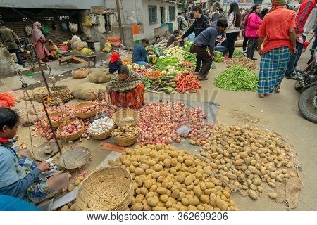 Kolkata, West Bengal, India - 16th December 2018 : Vegetables Are Being Sold Roadside. Young Man And