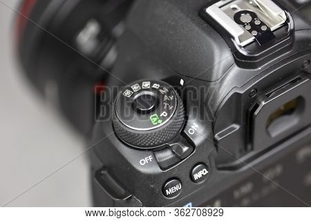 Tokyo, Japan 22.04.2020 - Dslr Camera Canon Mark 5d Iv Detail Shot Close Up Mode Dial Hot Shoe And V