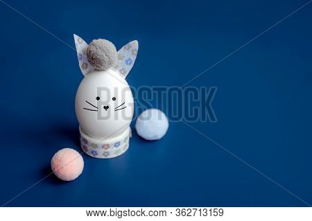 Easter Holiday Concept With Cute Handmade Egg Bunny. Frame With Copy Space For Text. One Easter Egg 