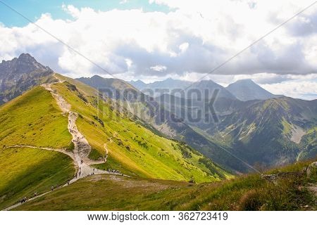 Mountain Panorama View On The Top Of A Kasprowy Wierch Mount In Tatry, Poland. Mountain Ragne Landsc