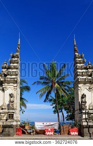 Kuta, Bali Island, Indonesia - April 16, 2020: Banner With Warning Sign On Entrance Gate To Beach Cl