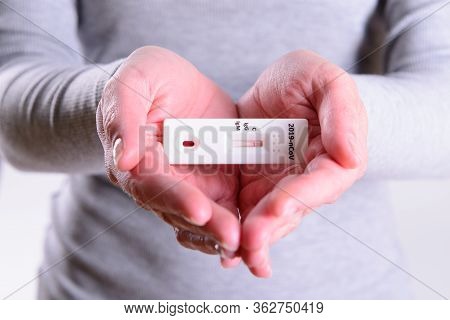 Rapid Covid-19 Coronavirus Strip Test Cassette For Antibody Or Sars-cov-2 Virus Disease In Hands Epi