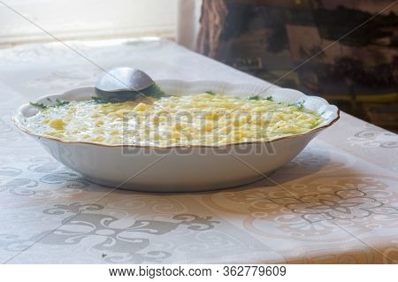 Polish Traditional Beef Broth With Lane Kluski Noodles.