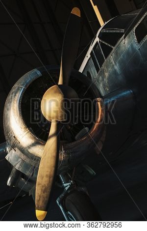 Old Military Airplane In A Hangar. Close Up