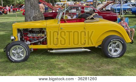 Side View Of A 1932 Yellow Ford Roadster