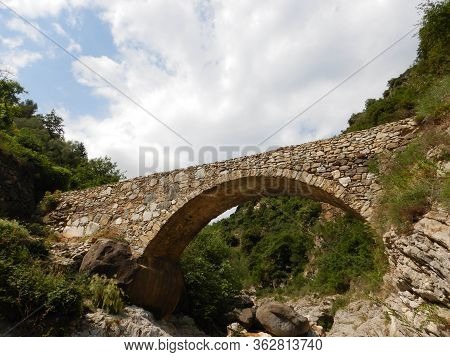 Stone Bridge In The Nervia Valley Near The Rio Barbaira Stream, Rocchetta Nervina, Liguria - Italy