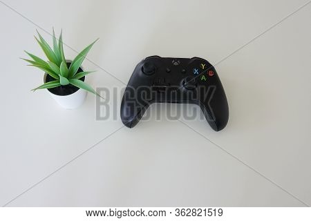 Orlando,fl/usa-4/10/20:  An Xbox Controller Used In Playing Video Games On A Xbox Video Gaming Syste