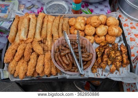 Kolkata, West Bengal, India - 16th December 2018 : Fried Pork, Chicken, Sausage, Fish Snacks Are Bei