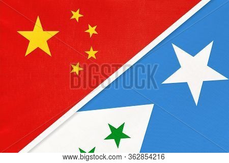 China Or Prc Vs Galmudug National Flag From Textile. Relationship Between Asian And African Countrie