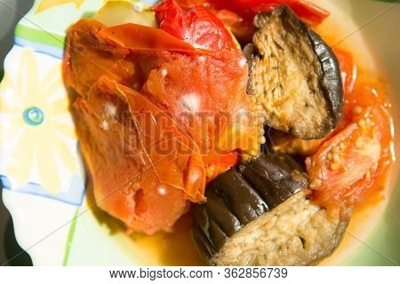 Mold On Stewed Vegetables, Spoiled Food Close-up On A Plate
