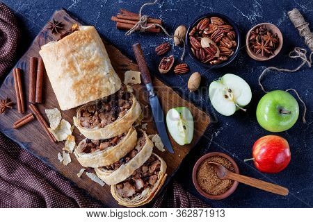 Traditional Austrian Apple Strudel Of Phyllo Dough With Sliced Caramelized Apples With Brown Sugar, 