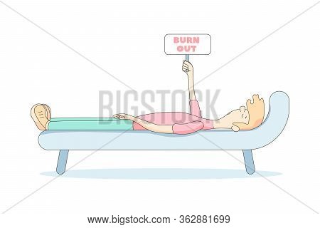 Burnout At Work. A Tired Man Is Lying On A Sofa With A Raised Sign That Says Burnout. Long Working D